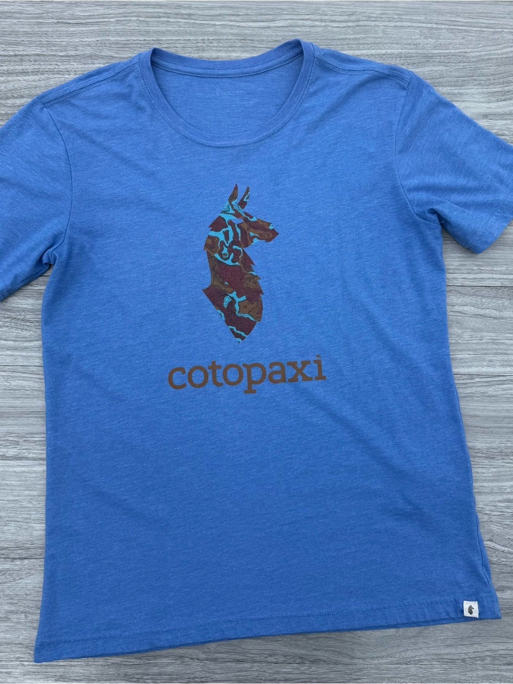 cotopaxi Women's Short Sleeve Tee in Heather Blue with Brown Logo